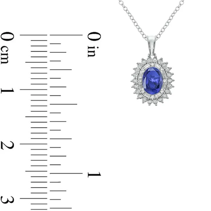 Goldia Oval LabCreated Blue Sapphire and 013 CT TW Diamond Starburst Double Frame Drop Pendant in Sterling Silver Necklaces Goldia Oval LabCreated Blue Sapphire and 013 CT TW Diamond Starburst Double Frame Drop Pendant in Sterling Silver Necklaces