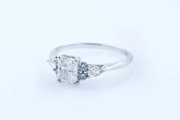 Crown Jewels Coin Rings 100 ct Radiant Cut Diamond Ring