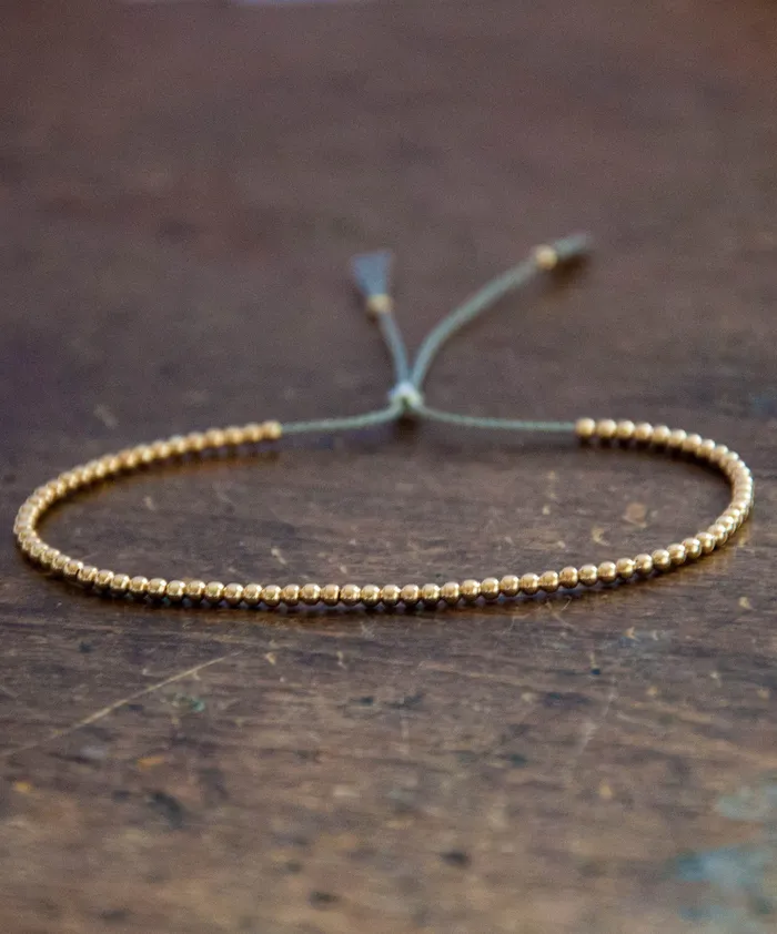Delicate 14k solid Yellow Gold beaded bracelet Vivien Frank Bracelets