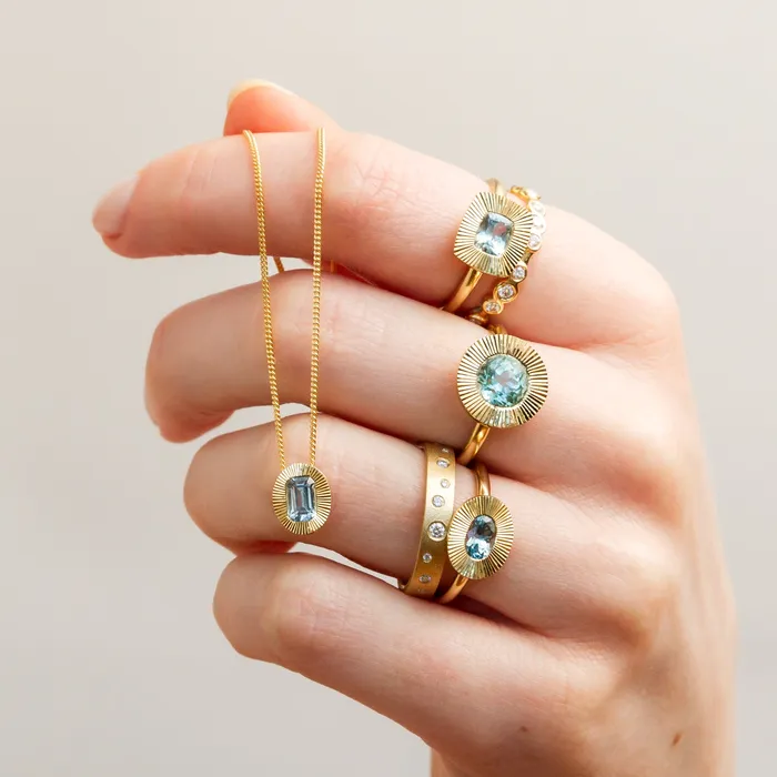 Rings 6x4mm EastWest Oval Aurora Ring Montana Sapphire in Yellow Gold Corey Egan
